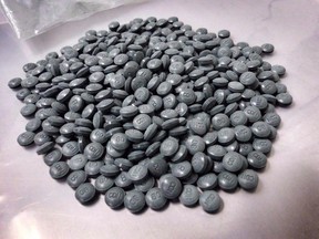 Fentanyl pills are shown in an undated police handout photo.