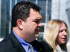 Former MP Dean Del Mastro with his wife Kelly arrive at the court in Oshawa on Tuesday April 5, 2016.