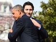 Prime Minister Justin Trudeau and U.S. President Barack Obama embrace on the South Lawn of the White House on March 10, 2016.