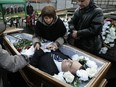 A handout photo provided by Hermitage Capital Management and taken on November 20, 2009 shows funeral of Russian lawyer Sergei Magnitsky in Moscow.