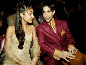 Singer Prince (R) and his wife Manuela Testolini sit in the audience at the 35th Annual NAACP Image Awards held at the Universal Amphitheatre, March 6, 2004