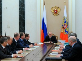 Mikhail Klimentyev/Sputnik, Kremlin Pool Photo via AP