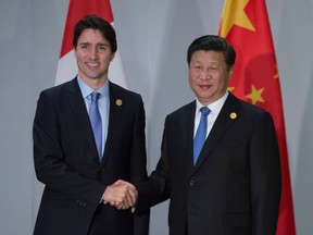 Prime Minister Justin Trudeau is greeted by Chinese President Xi Jinping as they take part in a bi-lateral meeting at the G20 Summit in Antalya, Turkey, in 2015.