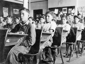 Residential schoolchildren in a typical classroom.