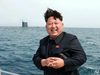 This undated picture released from North Korea’s official Korean Central News Agency (KCNA) on May 9, 2015 shows North Korean leader Kim Jong-Un smiling while observing an underwater test-fire of a submarine-launched ballistic missile at an undisclosed location at sea.