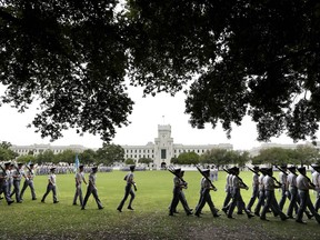 Citadel cadets practice for their weekly parade on the campus of the Citadel in Charleston, S.C., where a newly accepted cadet has been told she cannot wear the Muslim nijab.