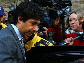 Jian Ghomeshi leaves at Old City Hall Courts in Toronto on Wednesday May 11, 2016.