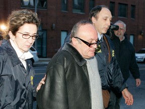 Rocco Sollecito is detained by RCMP officers in Montreal in November 2006.