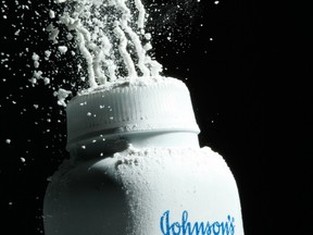 In this April 19, 2010, file photo, Johnson's baby powder is squeezed from its container