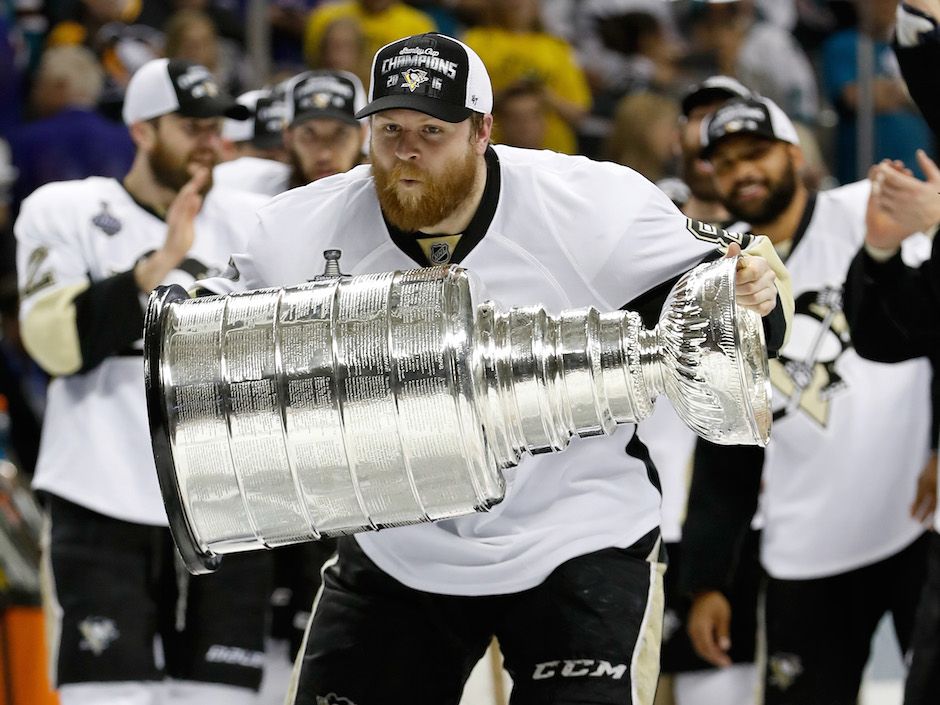 Jeff Zatkoff takes Stanley Cup down a water slide, because why not?