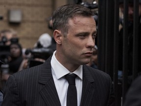 Oscar Pistorius leaves the North Gauteng High Court in Pretoria, South Africa in June.