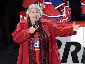 Ginette Reno sings the national anthems before game three of the National Hockey League second round Stanley Cup playoffs between the Boston Bruins and the Montreal Canadiens Tuesday, May 6, 2014 in Montreal.