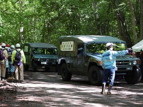 JIJI PRESS/AFP/Getty ImagesSelf-Defense Forces vehicles are heading to search for a missing boy in Nanae on Japan's main northern island of Hokkaido, on June 1, 2016.  Japan's military on June 1 joined the difficult search for a seven-year-old boy missing since his parents abandoned him in a bear-inhabited forest, officials said. / AFP PHOTO / JIJI PRESS / JIJI PRESS / Japan OUTJIJI PRESS/AFP/Getty Images