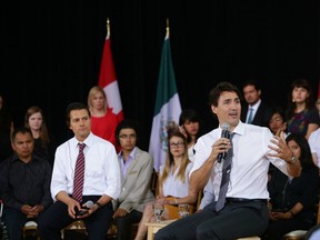 Justin Trudeau, and Mexican President Enrique Pena Nieto, shown during a youth question and answer session at the Canadian Museum of Nature in Ottawa, will be taking part in a meeting of NAFTA leaders last year.