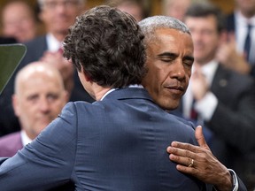 U.S. President Barack Obama hugs Canada's Prime Minister Justin Trudeau before his address to Parliament in the House of Commons last June.