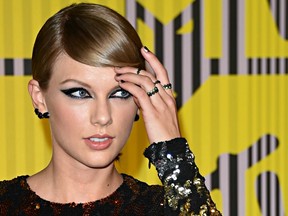 Singer Taylor Swift arrives on the red carpet at the 2015 MTV Video Music Awards at the Microsoft Theater in Los Angeles, California.