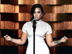 Singer Demi Lovato performs on stage during the first day of the Democratic National Convention at the Wells Fargo Center, July 25, 2016 in Philadelphia, Pennsylvania.