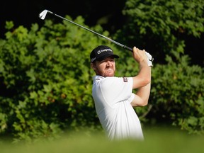 Jimmy Walker had no problem with the stifling heat at Baltusrol, and he was thrilled to see some putts finally go in. It led to six birdies on his way to a 5-under 65 and a one-shot lead over Emiliano Grillo and Ross Fisher among the early starters.