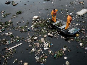 View of floating debris carried by the tide and caught by the "eco-barrier" before entering Guanabara Bay in Rio.