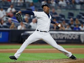 Aroldis Chapman #54 of the New York Yankees pitches against the Baltimore Orioles during their game at Yankee Stadium on July 18, 2016.