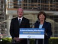 Premier Christy Clark and Finance Minister Michael de Jong, discuss amendments regarding housing issues in Greater Vancouver  during a press conference at the Legislature in Victoria