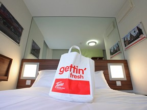 A welcome bag sits on a bed at a Tune Hotels Regional Services Sdn. Bhd. hotel in London, U.K.
