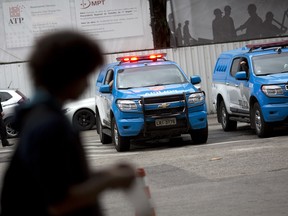 Police cars in Rio de Janeiro, Brazil, Wednesday, July 20, 2016