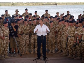 Then-British prime minister Tony Blair addresses troops in Basra, Iraq, in 2003.