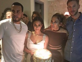 French Montana posted this incriminating shot of Harris and Kardashian together, along with Lopez.
