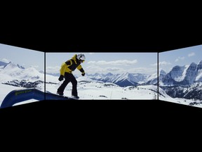 Canada's largest chain of movie theatres has announced it will open its first multi-screen cinemas that are intended to offer a panoramic experience this summer. An example of the panoramic screen in action is seen here.