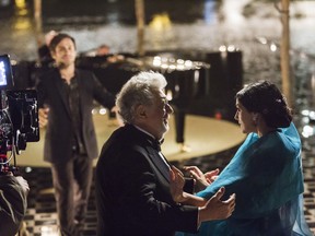 Placido Domingo with Monica Bellucci during a ìMozart in the Jungleî shoot in Venice, July 13, 2016. Domingo is the latest classical star to shoot a cameo for ìMozart in the Jungle,î There are now far fewer TV opportunities for classical artists.