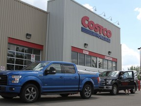 Two trucks sit parked in front of the Costco Wholesale in Sherwood Park. Charges have been laid against two Toronto parents who left their child in a parked car in front of a Costco.