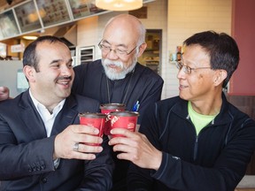 Davud Hanci, left, with Rev. Luis Hong and Rev. Moses Yuen in Calgary.
