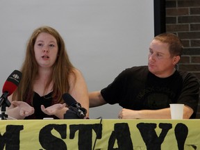 Ashlea Brockway, wife of former U.S. Marine Jeremy Brockway, speaks at a news conference in Toronto on Friday, July 22, 2016. Brockway urged the Liberal government to let American war resisters stay in Canada. Comforting her is another war dodger, former U.S. Marine Cpl. Dean Walcott.
