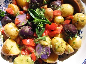 Home cooks are invited to set the table with uniquely Canadian ingredients on Food Day Canada, an annual national culinary party spearheaded by Anita Stewart, set for Saturday, July 30. Stewart concocted this colourful potato salad with potatoes from the University of Guelph's Elora Research Station and dressed it with a basil vinaigrette.