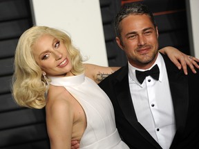 Lady Gaga and Taylor Kinney attending the 2016 Vanity Fair Oscar Party on February 28, 2016 in Beverly Hills, California.