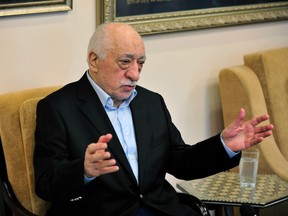 Islamic cleric Fethullah Gulen speaks to members of the media at his compound, Sunday, July 17, 2016, in Saylorsburg, Pa. Turkish officials have blamed a failed coup attempt on Gulen, who denies the accusation