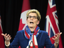 Ontario Premier Kathleen Wynne speaks about political fundraising at Queen's Park in Toronto on April 11, 2016.