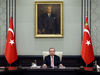 Turkey's President Recep Tayyip Erdogan heads an emergency meeting of the National Security Council in Ankara, Turkey, Wednesday, July 20, 2016.
