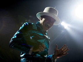 Frontman of the Tragically Hip, Gord Downie, leads the band through a concert in Vancouver, Sunday, July, 24, 2016.