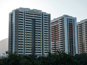 The Olympic Village in Rio officially opened its doors to the world's athletes on Sunday, less than two weeks before the Games begin -- but Australia, Britain and Brazil spurned the facility, which was dubbed "not safe or ready."