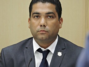 Peter Peraza, a Broward County sheriff's deputy testifies at his trial in Fort Lauderdale, Fla.