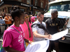 Pride Toronto executive director Mathieu Chantelois signs a list of demands by Black Lives Matter after they staged a sit-in at the annual Pride Parade on Sunday, July 3.
