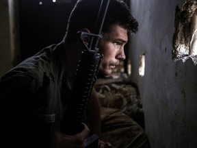 Levi J. Shirley guards a lookout point during clashes with ISIL fighters on April 17, 2015, in the outskirts of the northwestern Syrian town of Tel Tamar. Shirley was killed in a battle with ISIL on July 14.