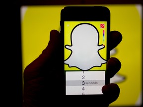 The Snapchat Inc. application displayed on an iPhone. Cellphone videos showing a girl partially nude, stumbling and slurring went live on the social media app
