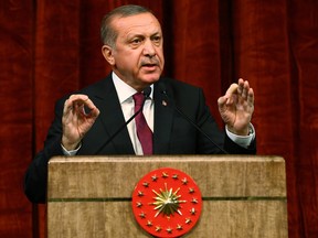 Turkey President Recep Tayyip Erdogan gives a speech commemorating those killed and wounded during a failed July 15 military coup, in Ankara, Turkey, late Friday, July 29, 2016