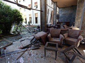 Damage caused by military helicopter bombardments inside Turkey's parliament near the Turkish military headquarters in Ankara, Turkey, Saturday, July 16, 2016