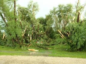 Debris is scattered across the New Rosedale Hutterite colony southwest of Portage la Prairie, Man. on Wednesday, July 20, 2016