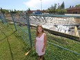 Kelli Fredlund, co-chair of the Lakeridge Playground Association, stands in from of the construction site on, Tuesday, July 19.