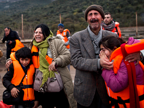 A Yazidi refugee family arrives at the Greek island of Lesbos in 2015.
